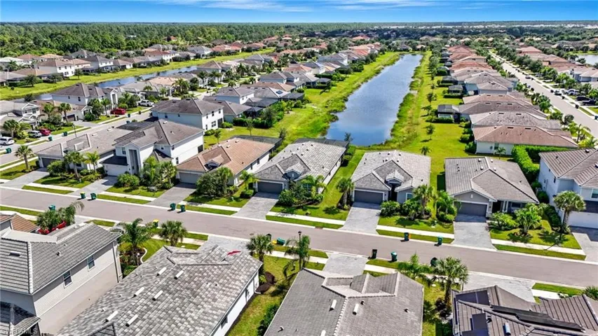 Aerial view of residential area with a large body of water