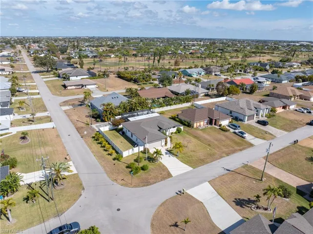 View of property location with nearby suburban area