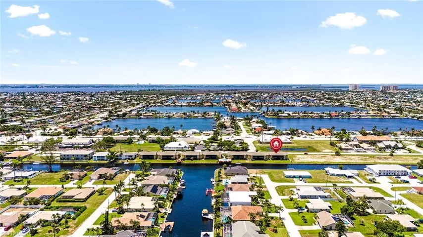 Bird's eye view of building and nearby gulf waters