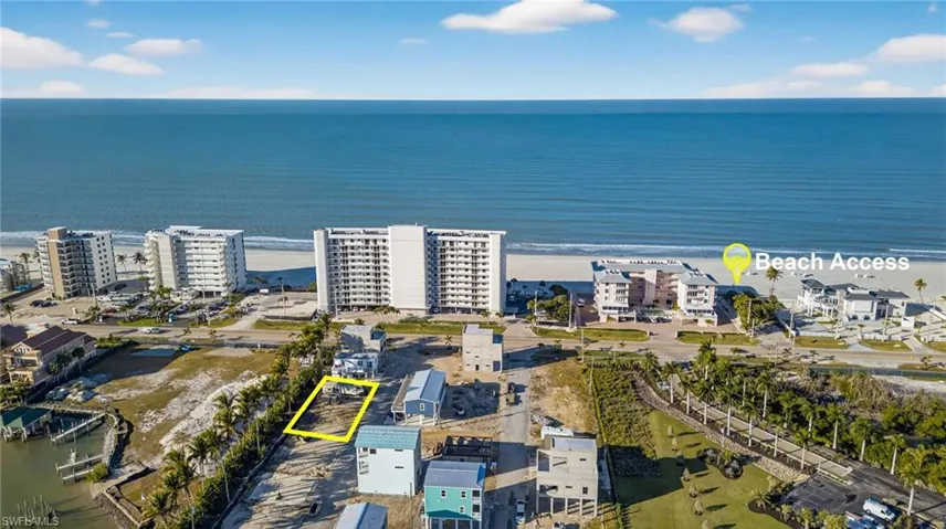 Vacant coastal lot featuring proximity to the shoreline and waterfront placement