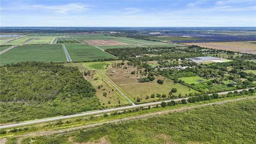 View of rural area featuring large plots for crops