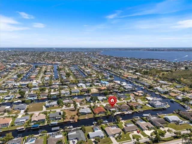Bird's eye view with a water view and a residential view