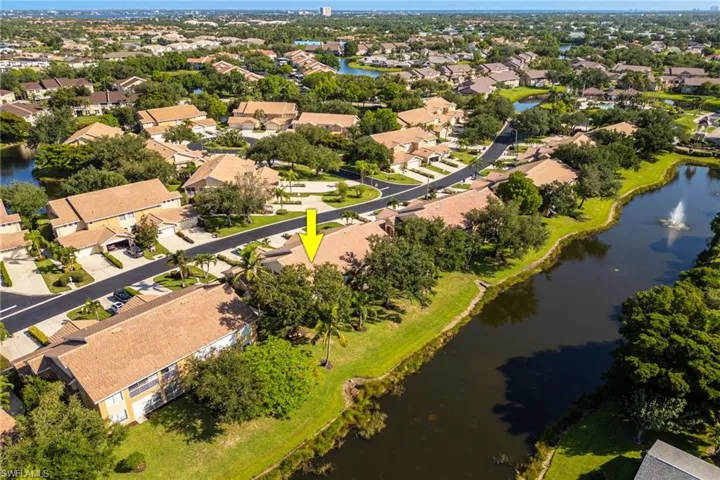 Aerial view of residential area with a nearby body of water