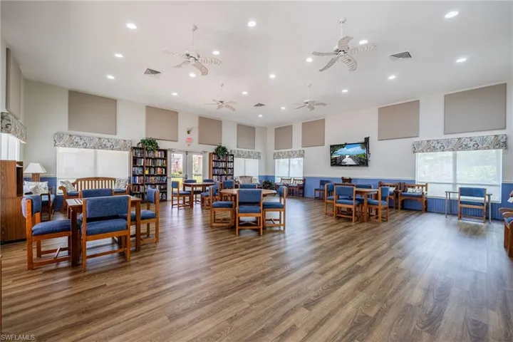 Building lobby with a towering ceiling and recessed lighting
