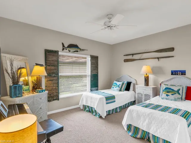 Bedroom with carpet floors and ceiling fan