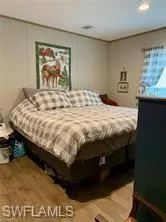 Bedroom featuring hardwood / wood-style flooring