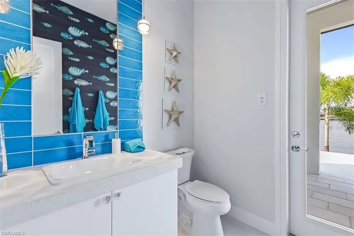 Half bath with toilet and vanity