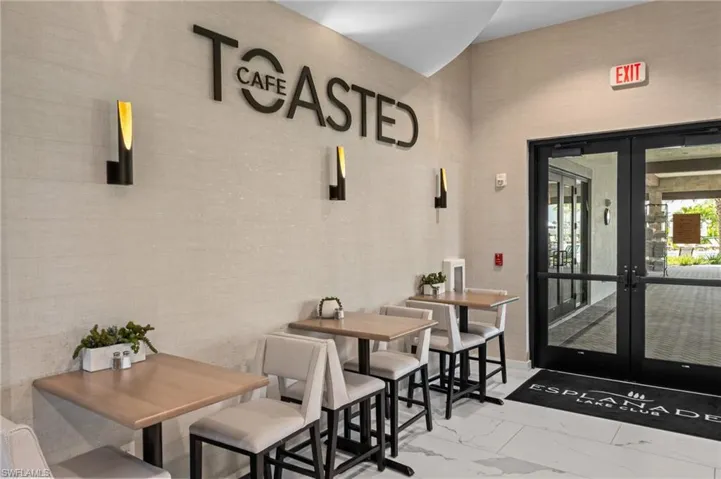 Dining area with french doors and marble finish floors