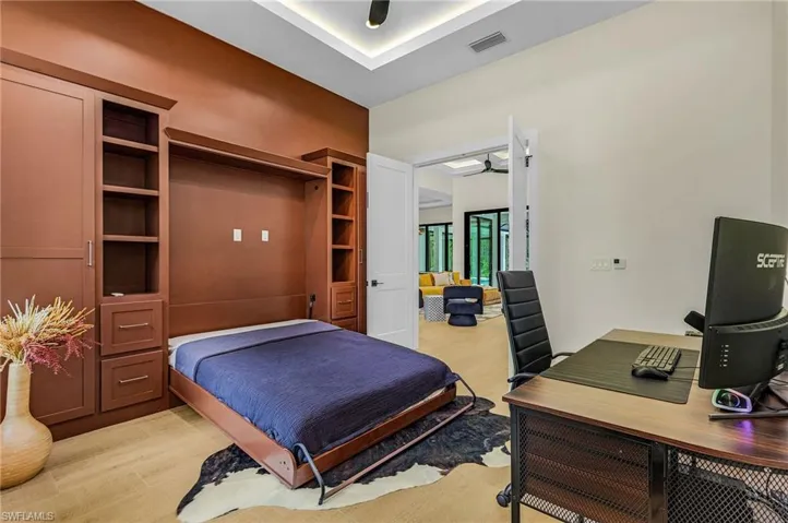 Office has custom murphy bed for convenience
