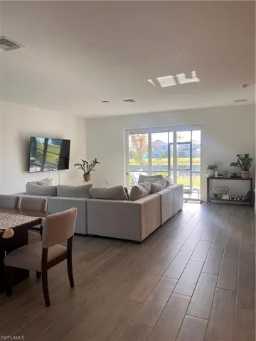 Living area with wood finished floors