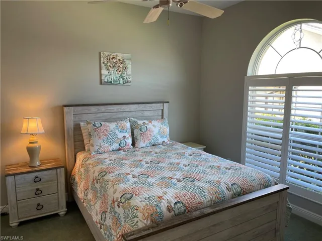View of middle bedroom with plantation shades