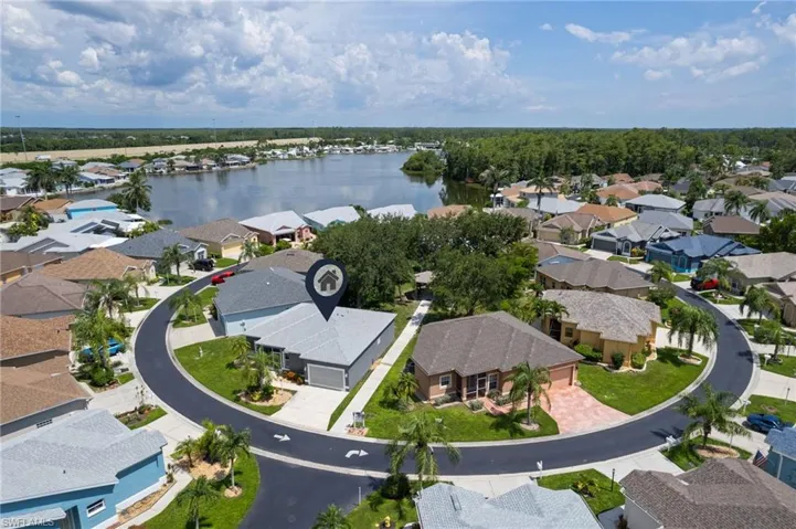 Aerial view of residential area with a large body of water