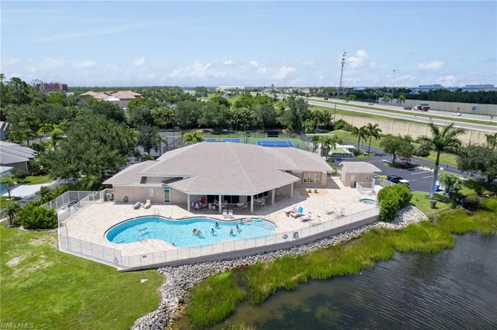 Community pool featuring a patio area