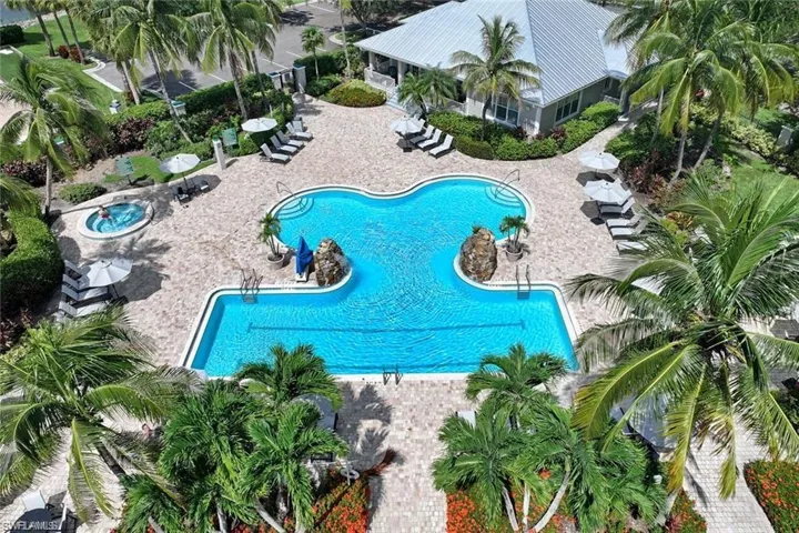 Community pool featuring a patio area