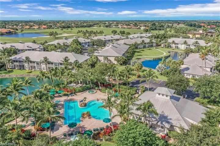 Bird's eye view of a nearby body of water and a golf course