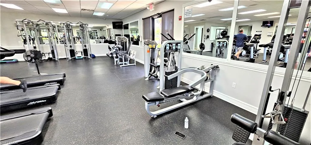 Gym featuring a drop ceiling