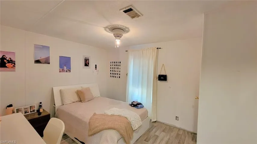 Bedroom with light wood-type flooring