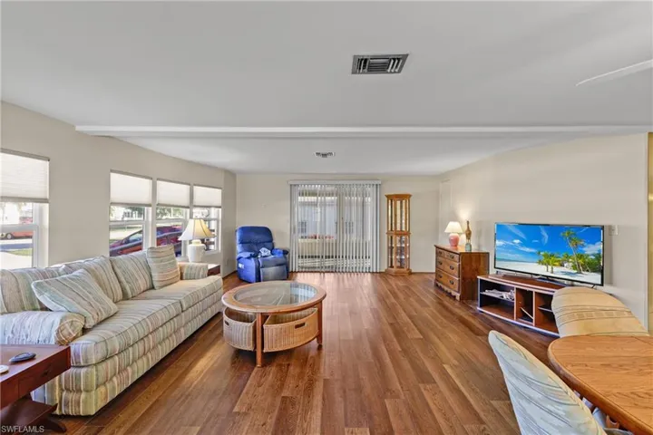 Living room featuring wood-type flooring