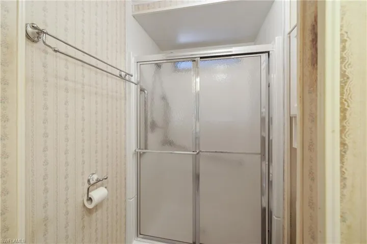 Bathroom featuring an enclosed shower