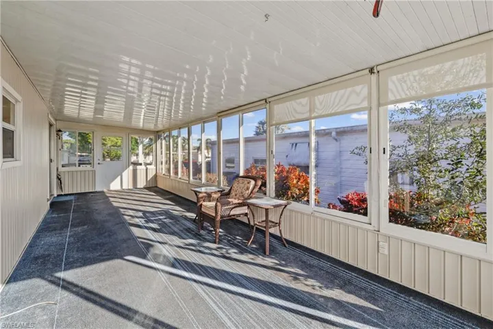 Sunroom with ceiling fan