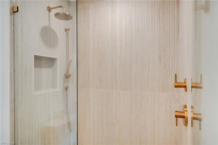 Bathroom with a tile shower
