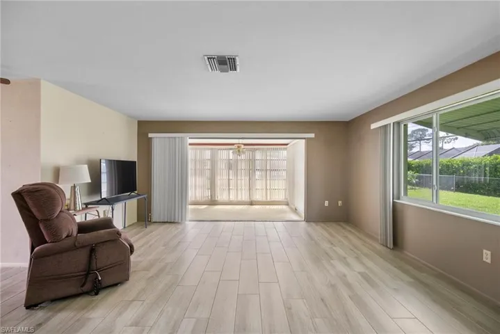 Sitting room featuring light hardwood / wood-style flooring