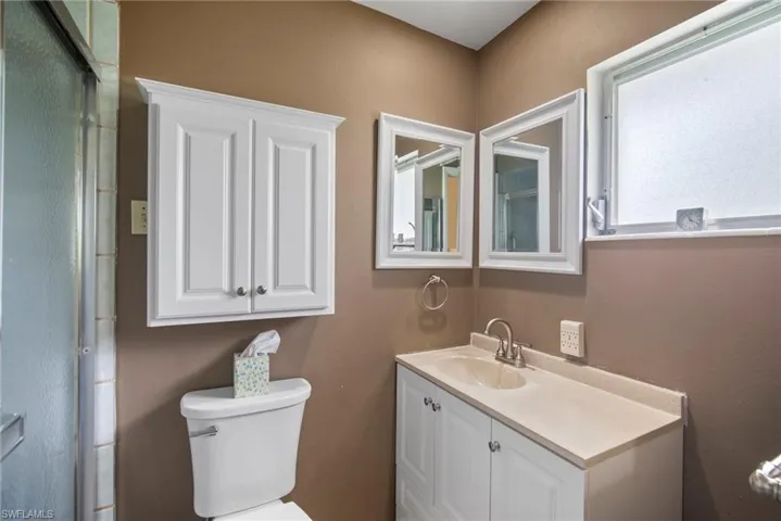 Bathroom with toilet and vanity