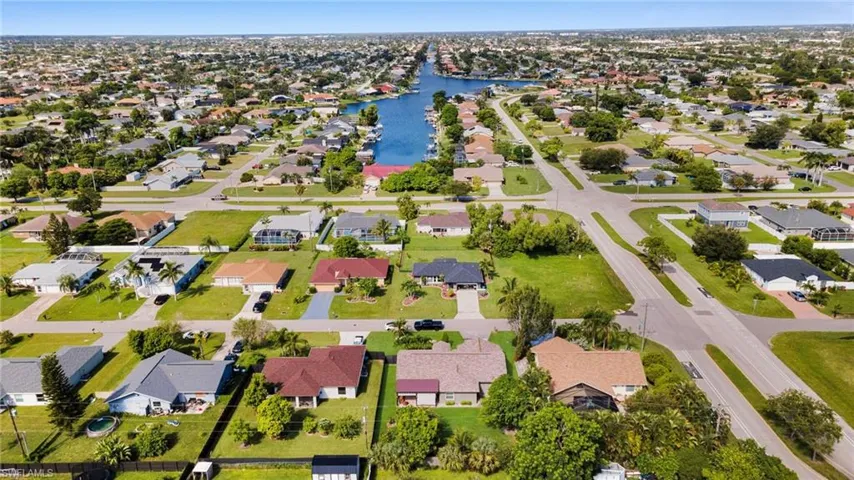 Aerial view of residential area with a large body of water