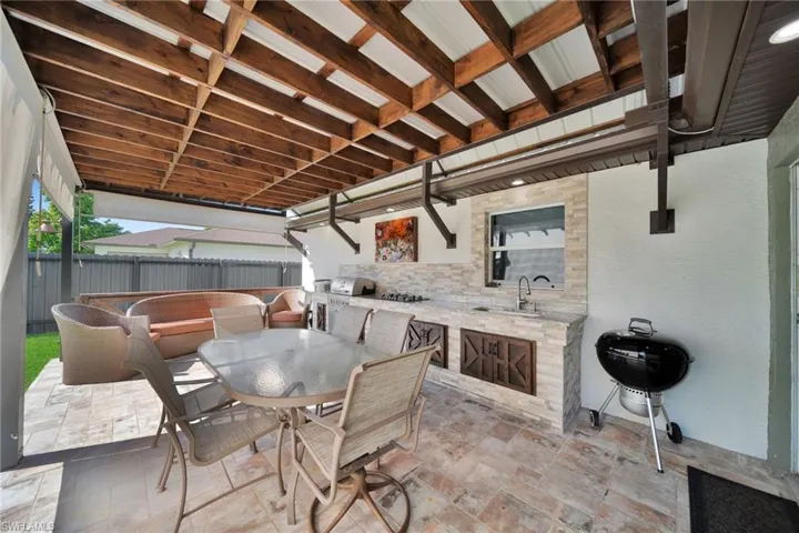 View of patio / terrace featuring outdoor dining space and area for grilling
