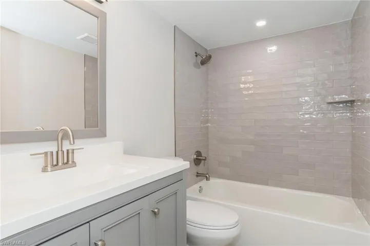 Unfurnished bedroom with a ceiling fan, light wood finished floors, and recessed lighting