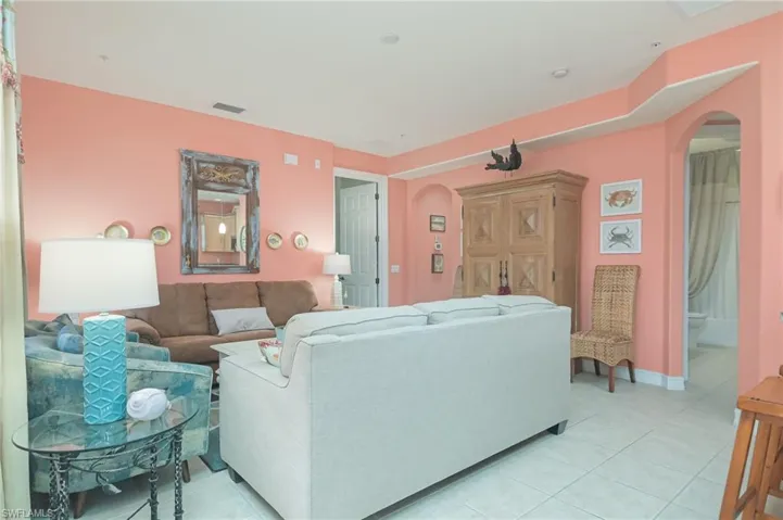 Living room with light tile floors