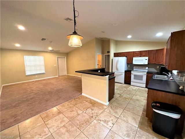 3303 E 8th  ST, LEHIGH ACRES, FL 33972