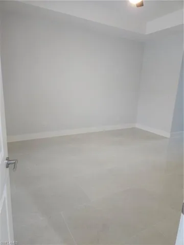 View of tiled spare room