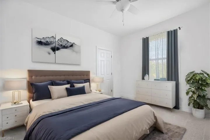 Bedroom # 2with carpet and a ceiling fan