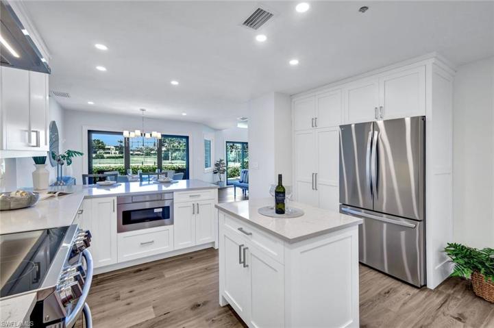 Kitchen with Plenty of Storage and Back View