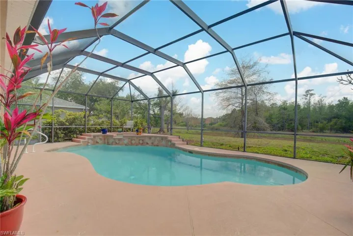 Refresh in your private pool overlooking the preserve!