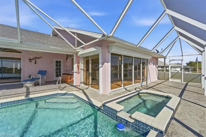 Heated Spa, pool & tanning area of pool deck