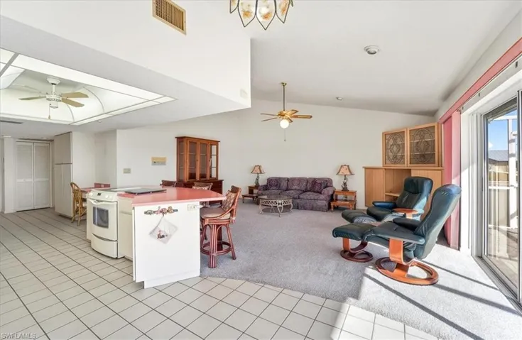 Dinette overlooks the pool, spa, Kitchen, & Family room.