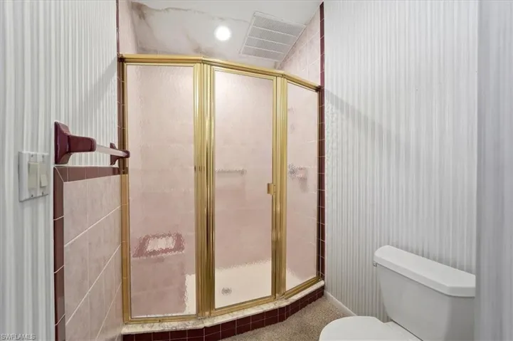 Primary Shower, roof has been replaced, interior damage from before new roof.