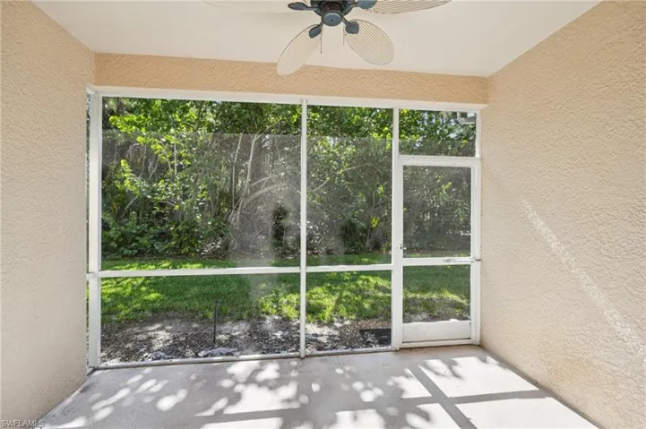 Unfurnished sunroom featuring plenty of natural light