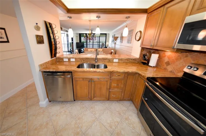 VIEW FROM KITCHEN INTO LIVING AREA