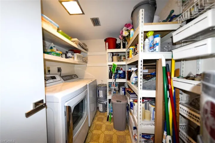 LAUNDRY ROOM WITH LOTS OF STORAGE