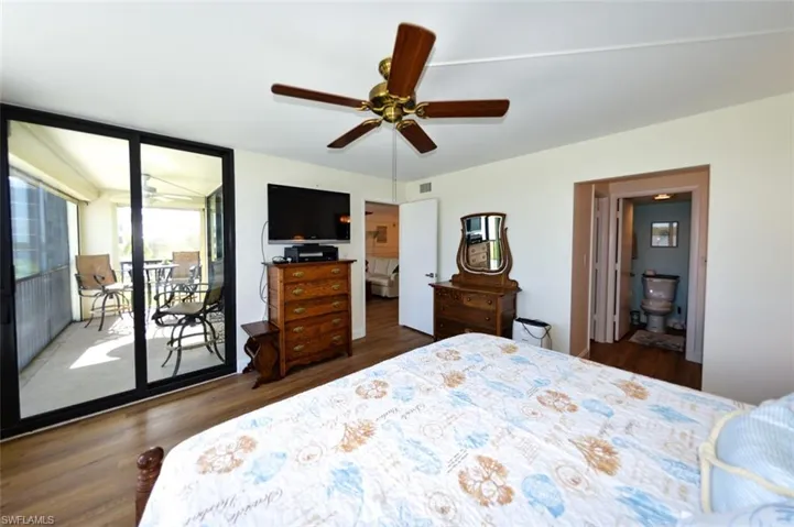 OWNER'S SUITE SHOWING ENTRANCE TO LIVING AREA (MIDDLE) AND EN-SUITE BATH AREA (RIGHT)