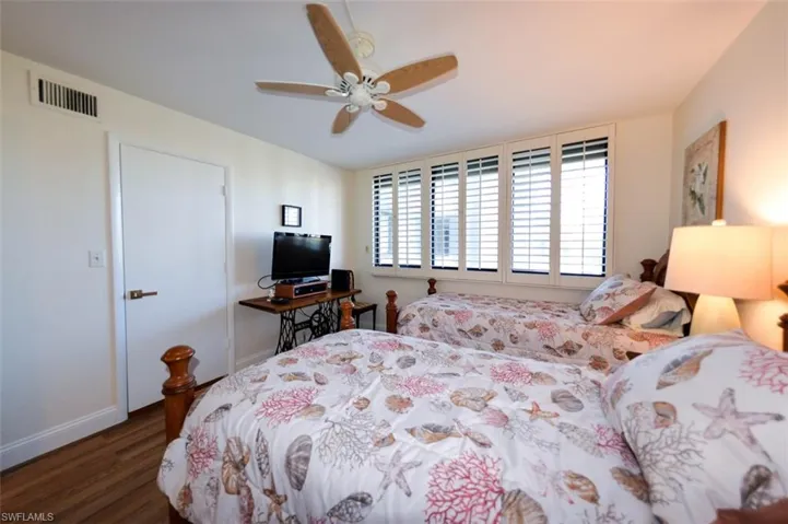 GUEST BEDROOM.  DOOR IS TO WALK-IN CLOSET.