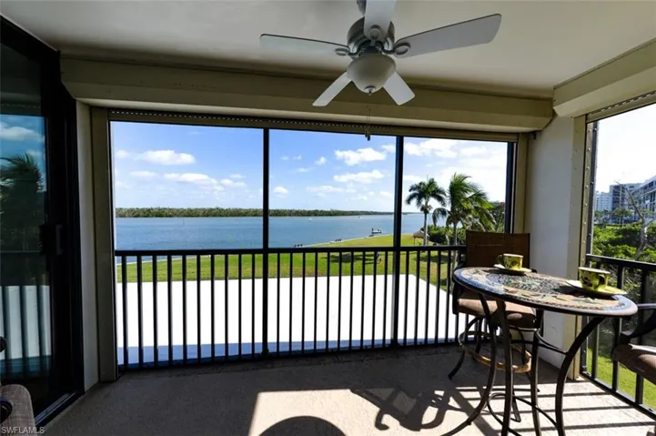 LANAI.  ENTRANCE TO OWNER'S SUITE IS SHOWN AT LEFT.  ELECTRIC STORM SHUTTERS.