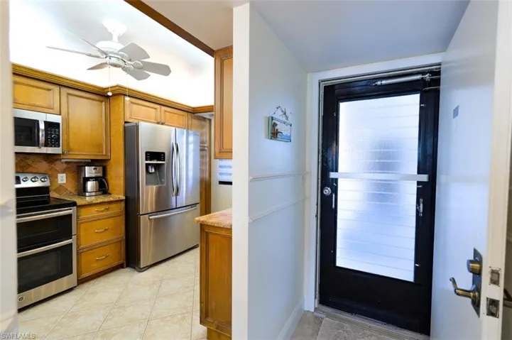 UNIT ENTRANCE AND ENTRANCE TO KITCHEN