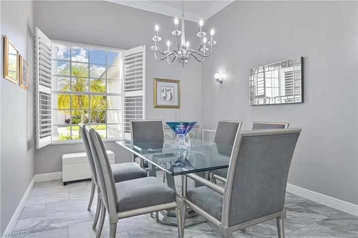 Private dining area, crown molding and plantation shutters !