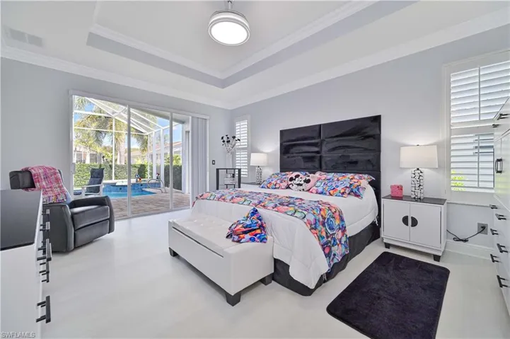 Primary suite with view of your tropical oasis !