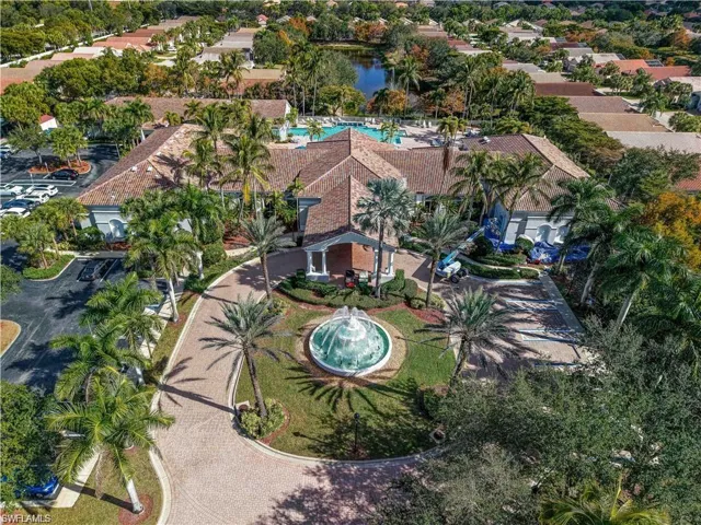 55+ Community clubhouse aerial view with Cascading Fountains at Clubhouse and at Entry !