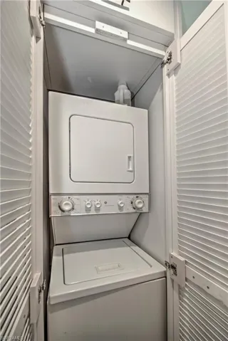 Bathroom featuring vanity, toilet, and walk in shower